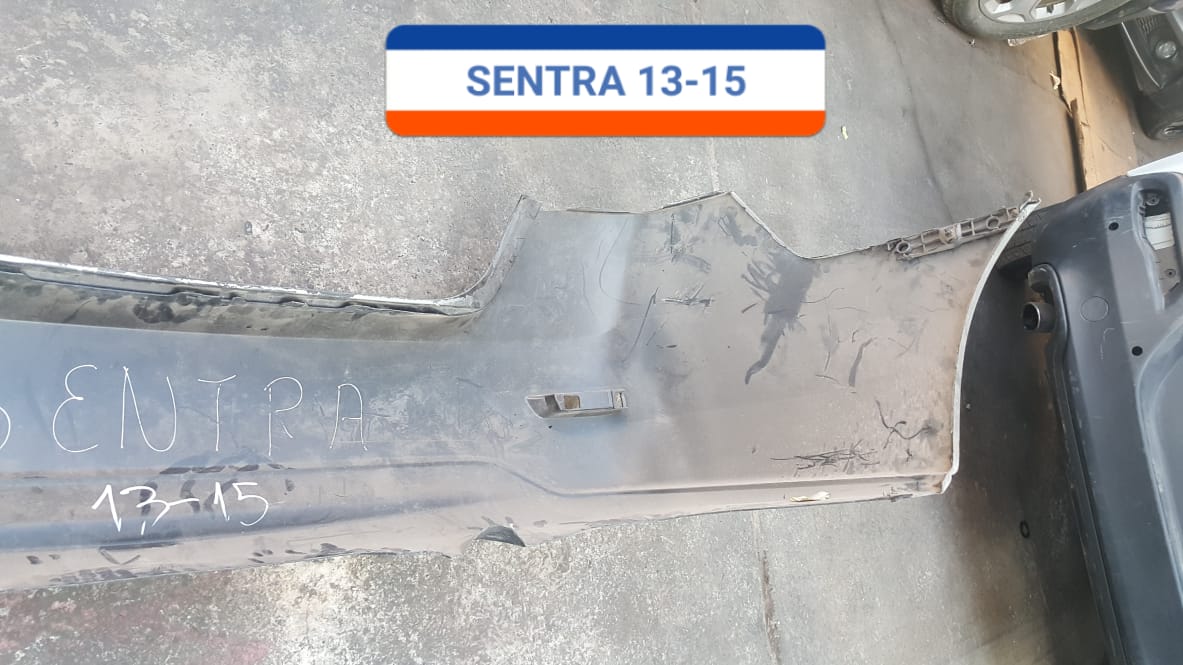 PARACHOQUES POSTERIOR NISSAN SENTRA 2013 AL 2015 CON DETALLE